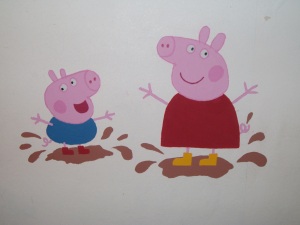 Peppa and George puddle jumping